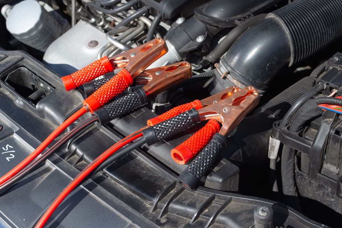 A discharged car battery with corroded terminals