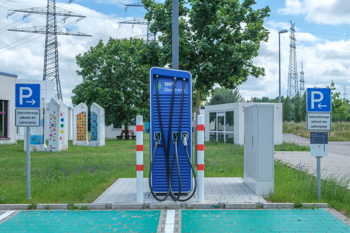 An electric vehicle charging at a public charge point